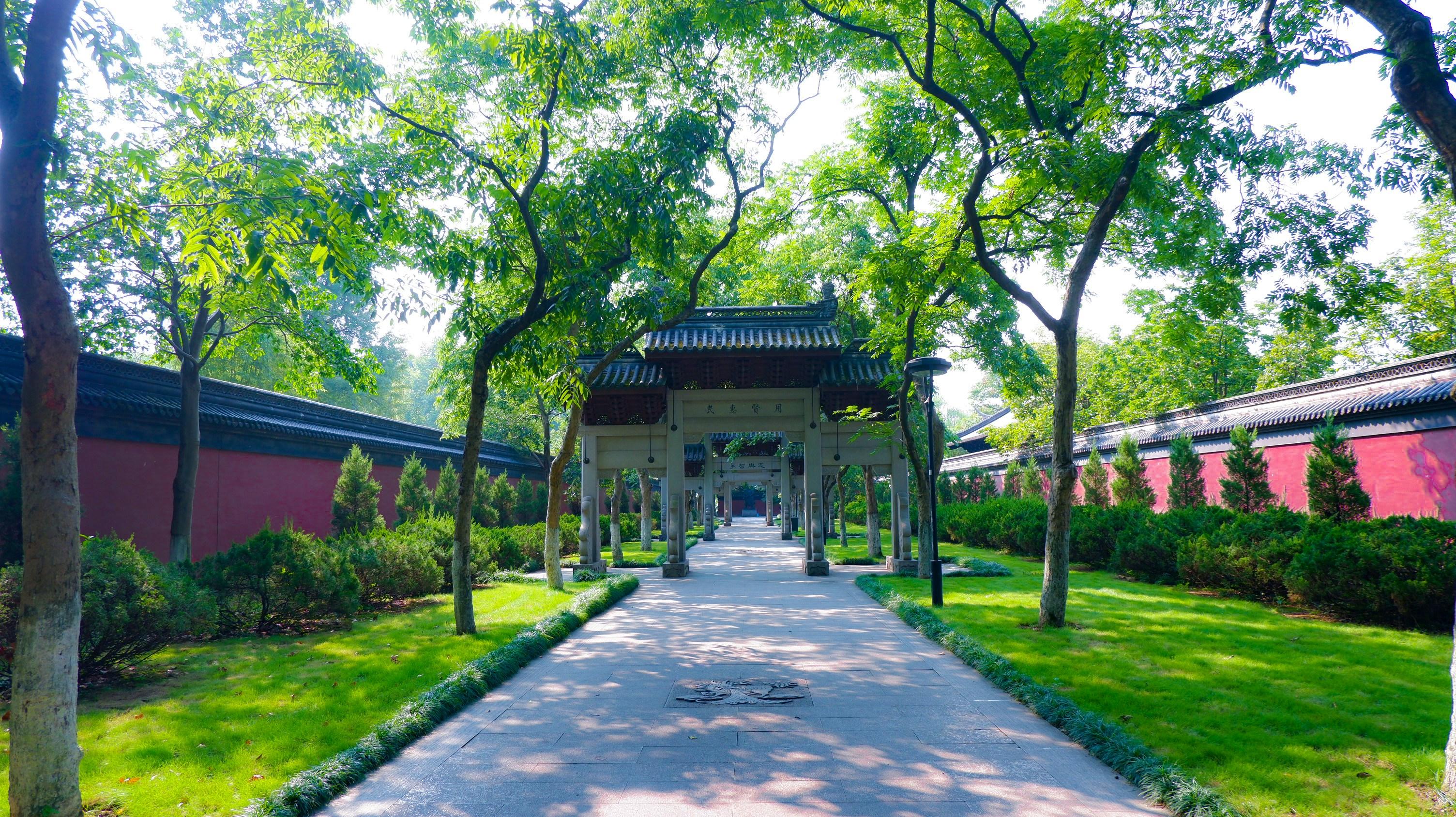 Historic university building with traditional Chinese garden