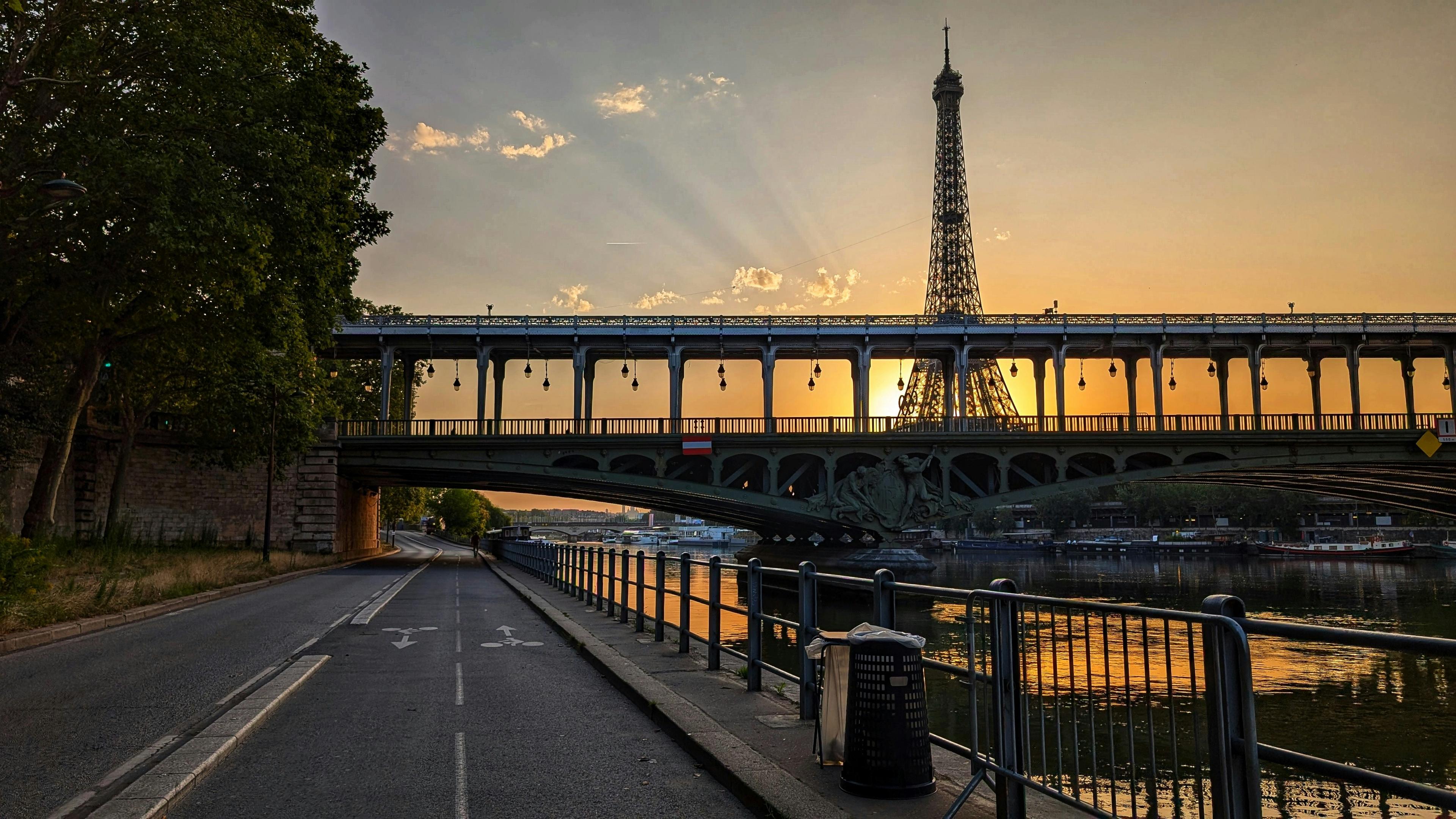 Eiffel Tower in Paris with Seine River and historic buildings during golden hour