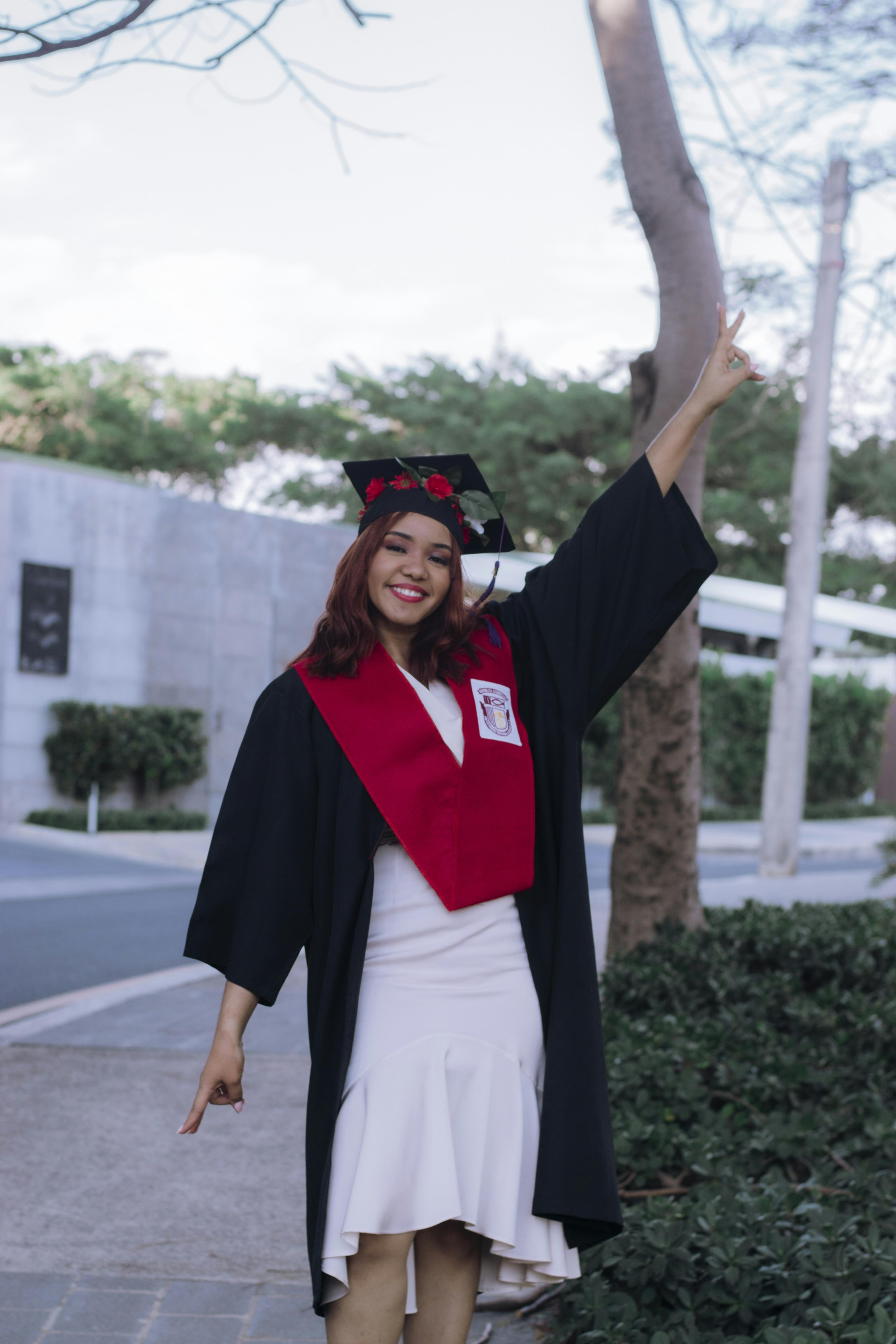 Portrait of smiling student in graduation attire